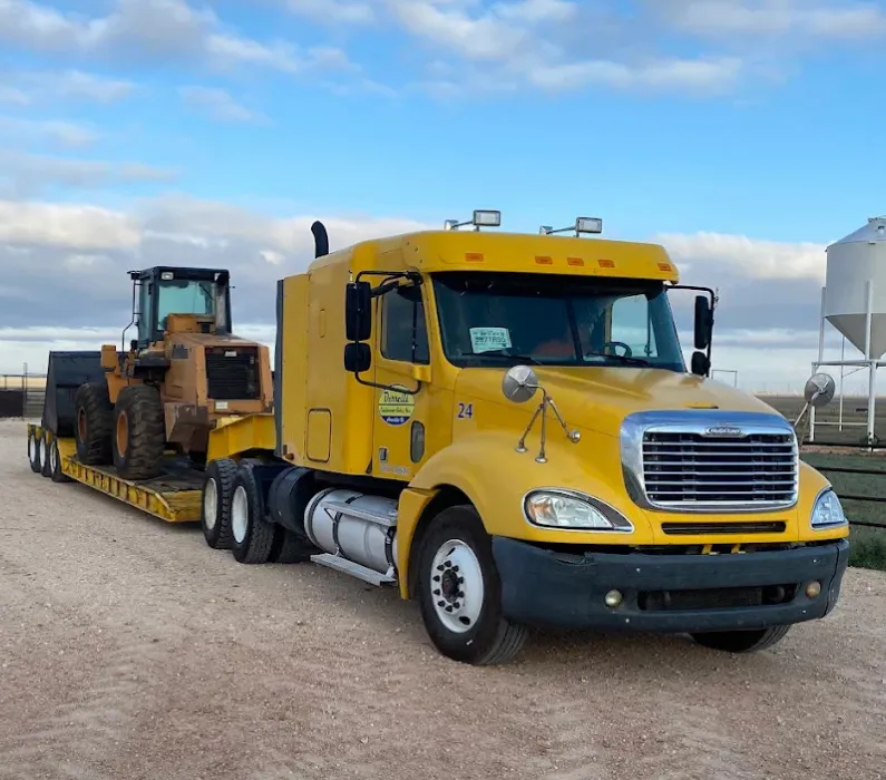 truck towing a tractor