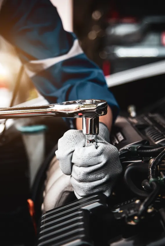 auto tech using wrench
