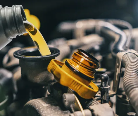 Mechanic working on car brakes