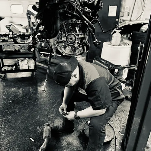 Auto shop professional working on tires