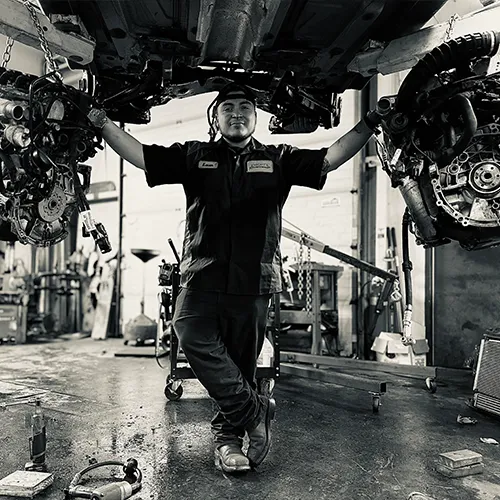 Collision repair expert detailing vehicle