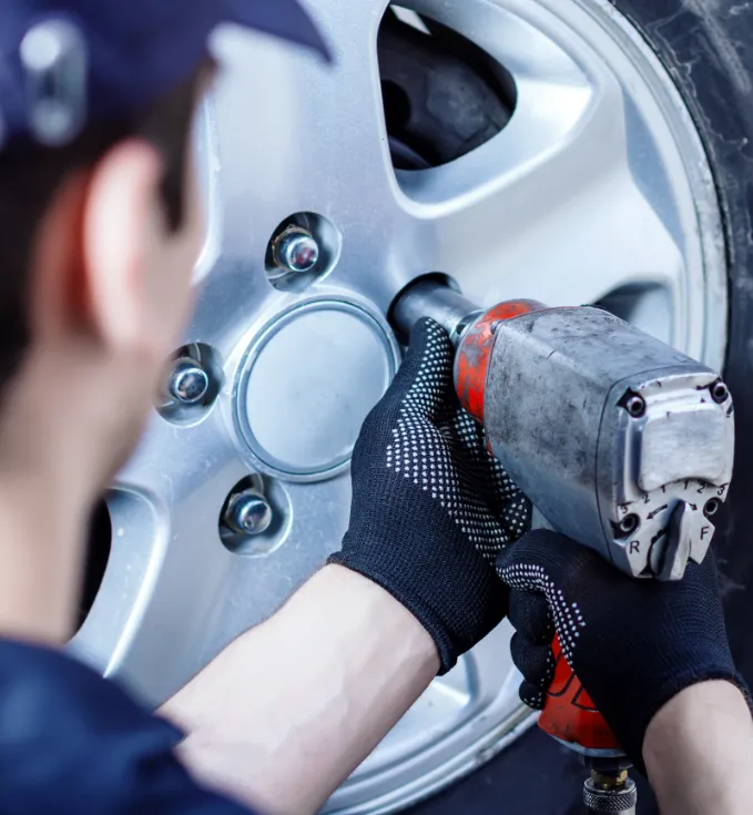 woman smiling sitting at a desk