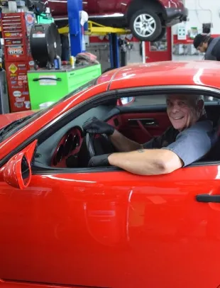 tech changing a tire