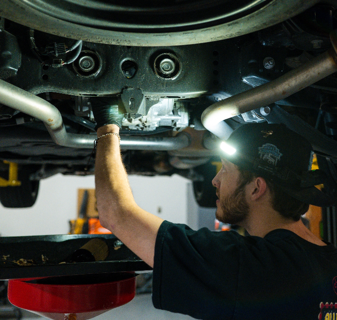 Technician under vehicle